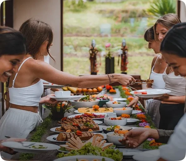 Yoga teacher training students enjoying a healthy meal together in Thailand