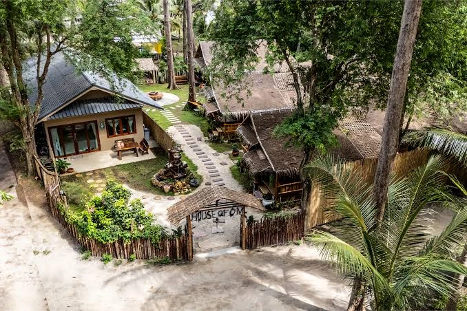 House of Om yoga teacher training center surrounded by tropical nature in Thailand