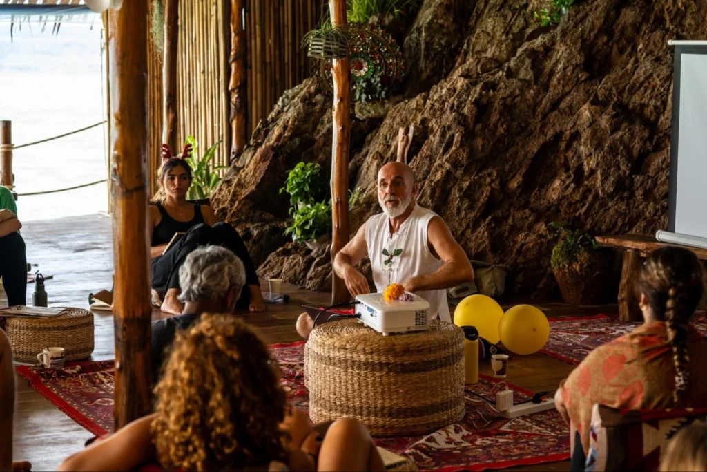 Yoga instructor teaching students during a House of Om 200-hour yoga teacher training class