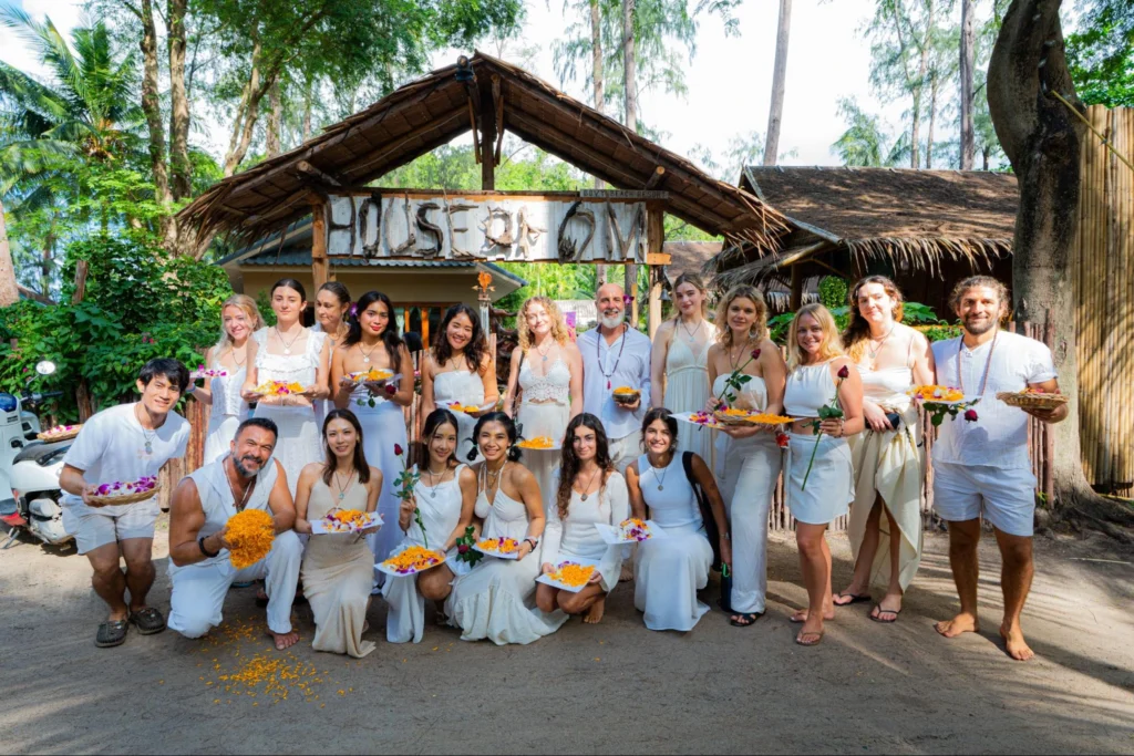 House of Om yoga teacher training graduates celebrating together in Thailand