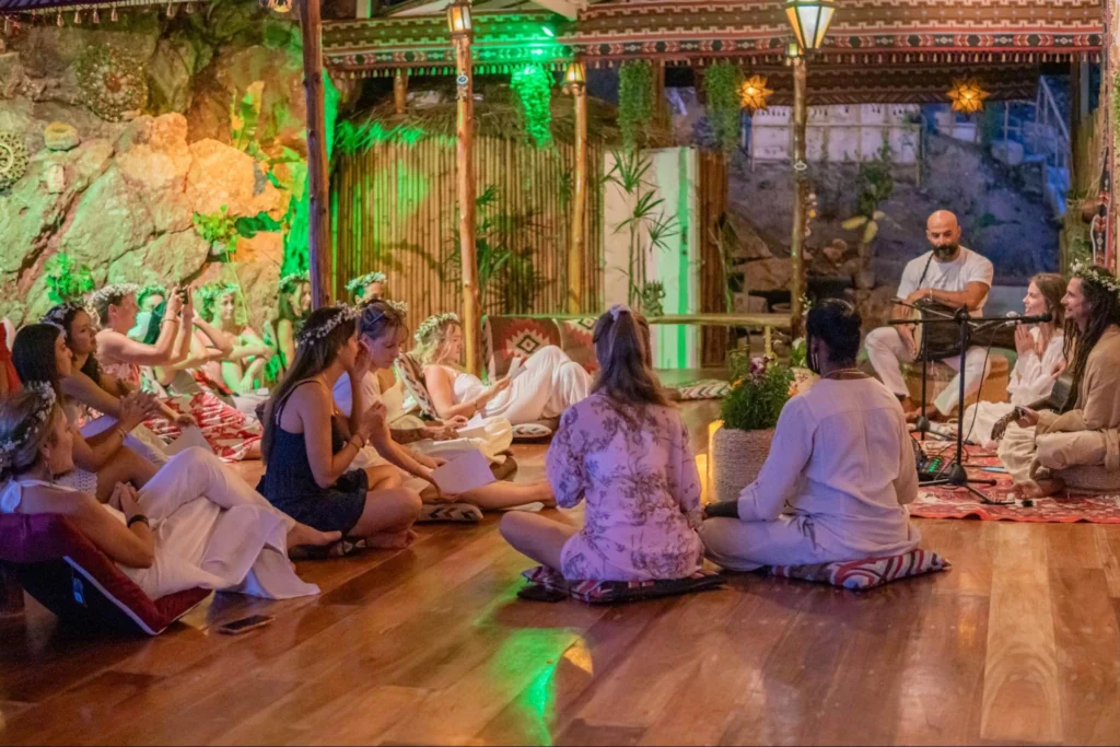 House of Om yoga teacher training students attending an evening group session in Thailand