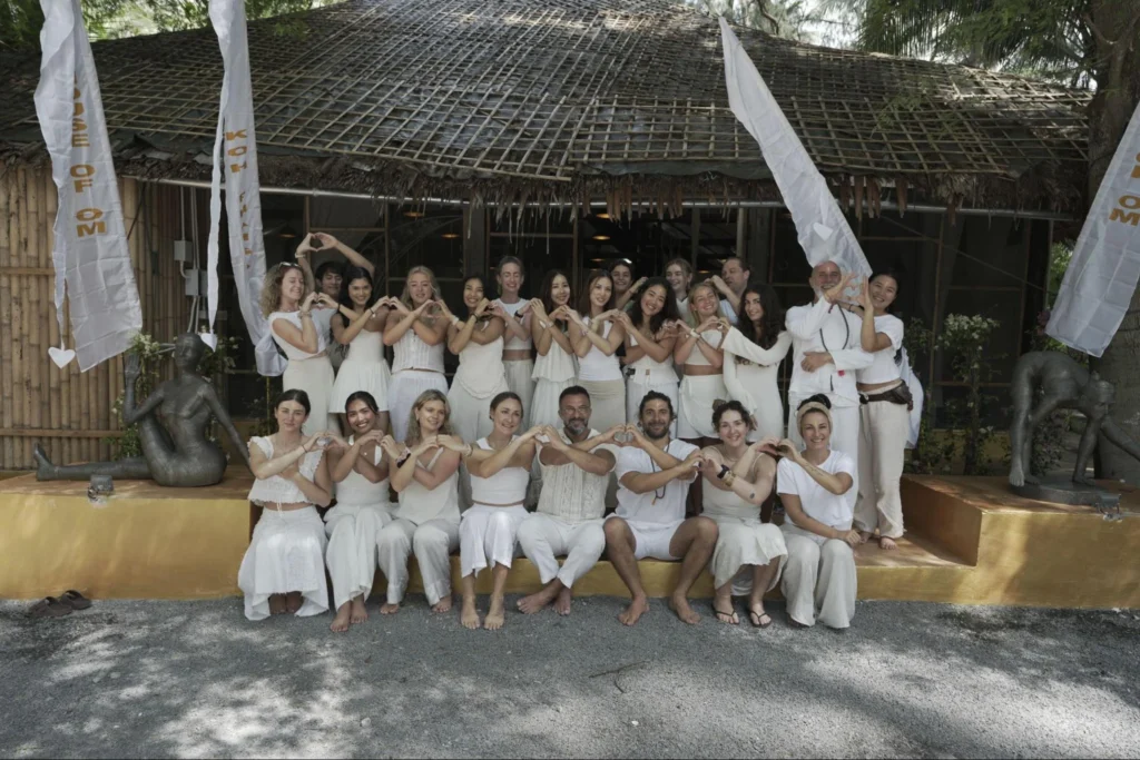 House of Om yoga teacher training group celebrating together after their course
