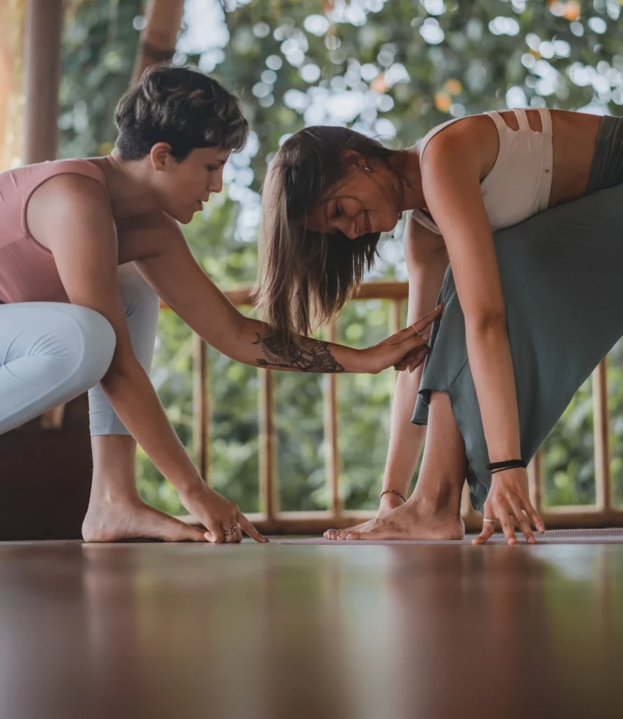 Yoga teacher training students sharing a joyful moment together in Bali